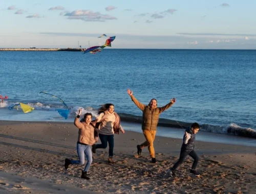 young-people-getting-their-kite-up